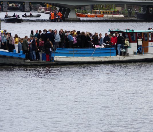 Kingsday in Amsterdam by boat