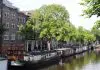 Woon je naast een Amsterdamse Airbnb woning en heb je daar overlast van? Dit moet je weten over burenrecht