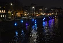 Winteravond op de grachten tijdens het Amsterdam Light Festival Winteravond op de grachten tijdens het Amsterdam Light Festival