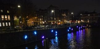 Winteravond op de grachten tijdens het Amsterdam Light Festival Winteravond op de grachten tijdens het Amsterdam Light Festival